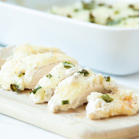 Caesar Chicken Sliced on a Cutting Board