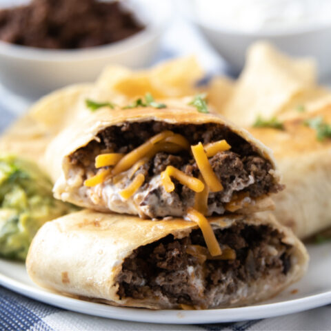 Grilled Burritos Stacked on a Plate