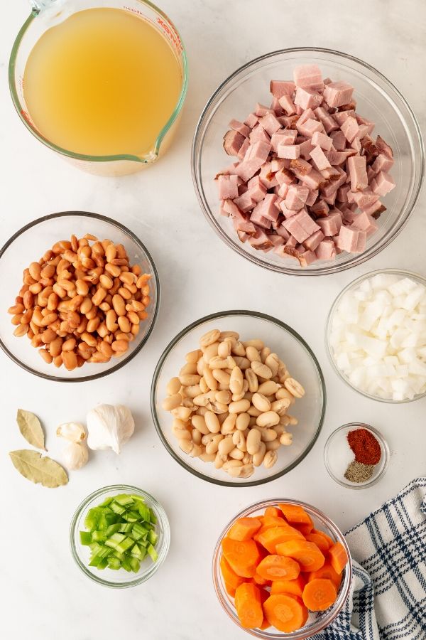 ham and bean ingredients in bowls on table 
