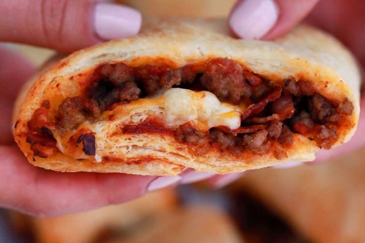 holding a pinwheel in hands