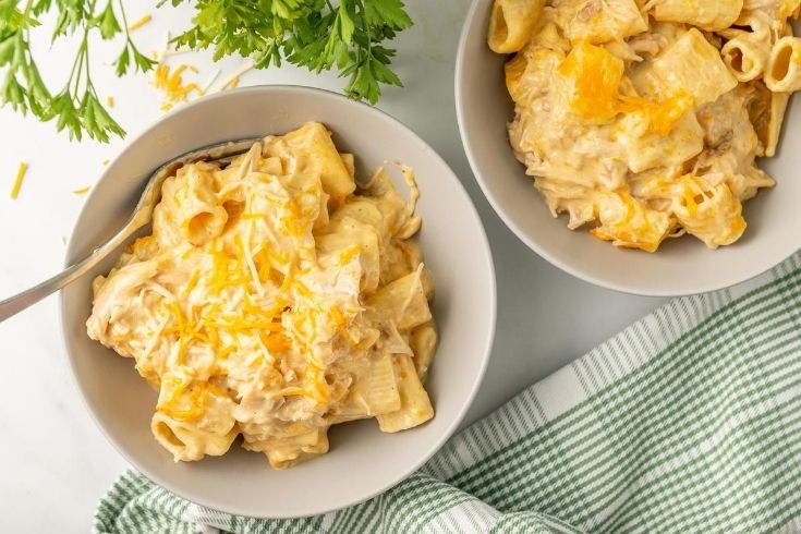 rigatoni in a bowl with spoon