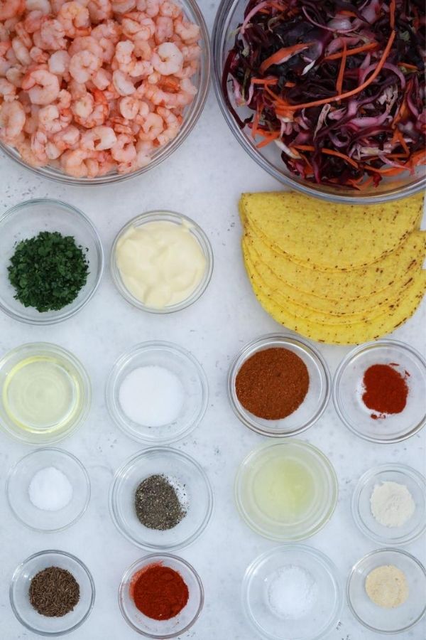 ingredients for shrimp tacos on table