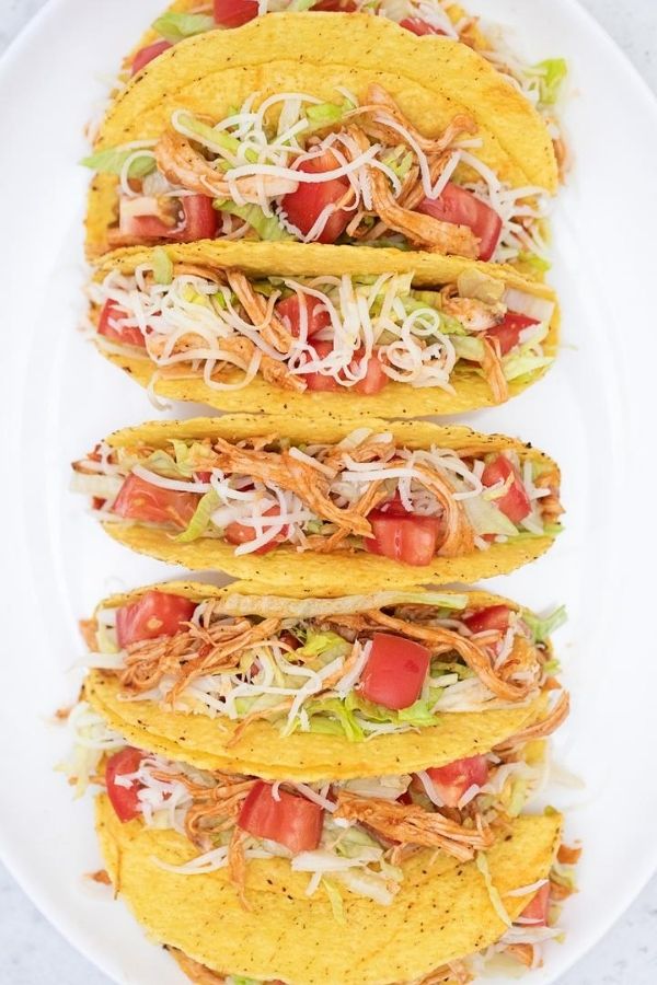 crunchy chicken tacos on a platter 