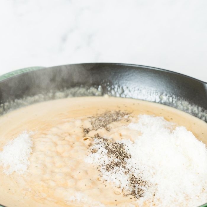 cheese and sauce in a skillet 