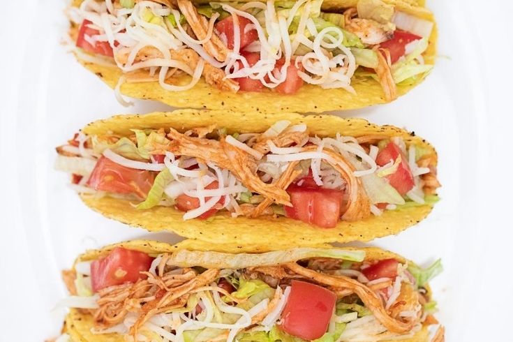 Shredded Chicken Tacos on a white plate