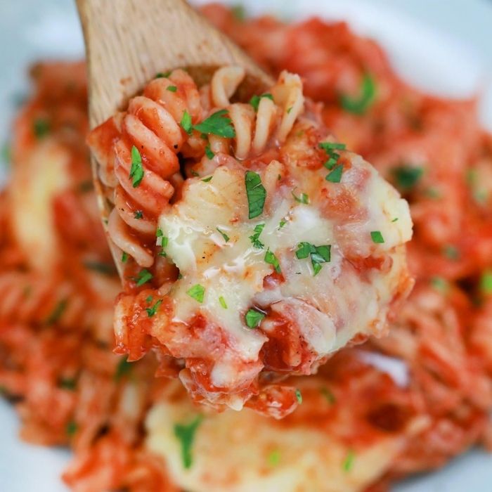 chicken parmesan on a wooden spoon