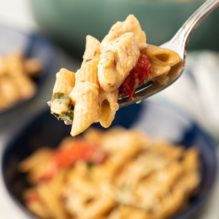 creamy chicken pasta on a spoon