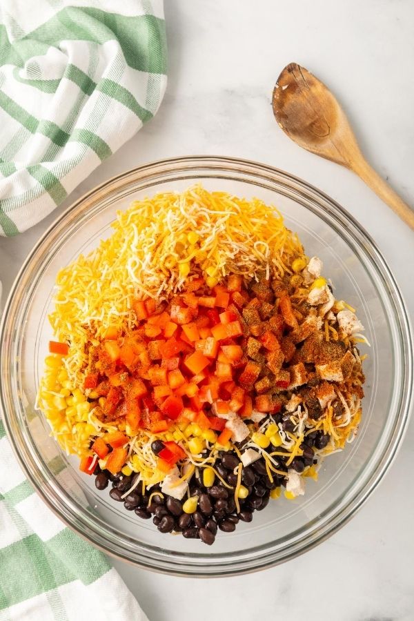 bowl with chicken for ingredients for egg rolls 