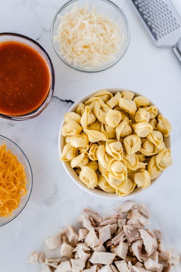 ingredients for tortellini casserole on table 