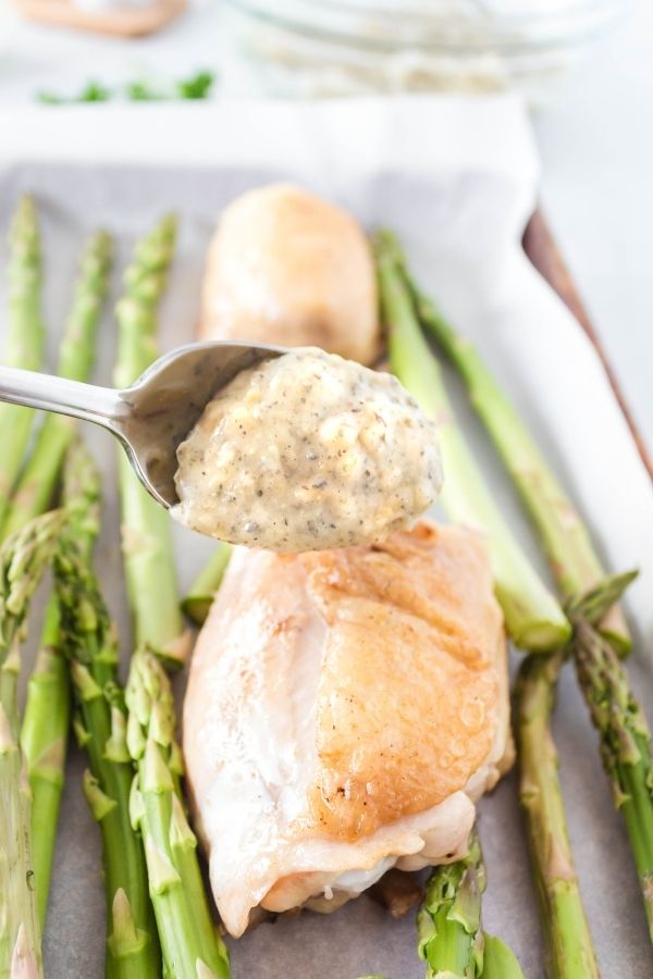 spooning sauce on chicken 