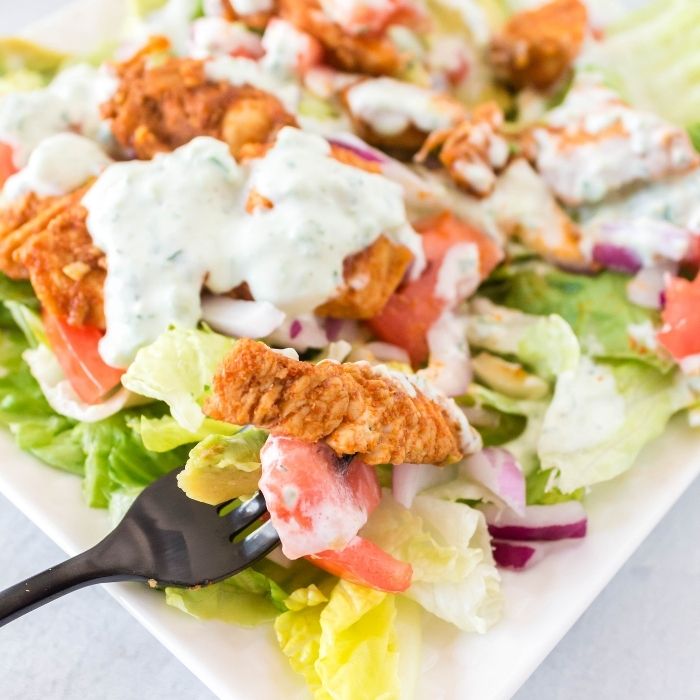 homestyle chicken salad with fork in it 