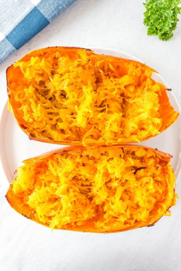 cooked spaghetti squash on plate on table