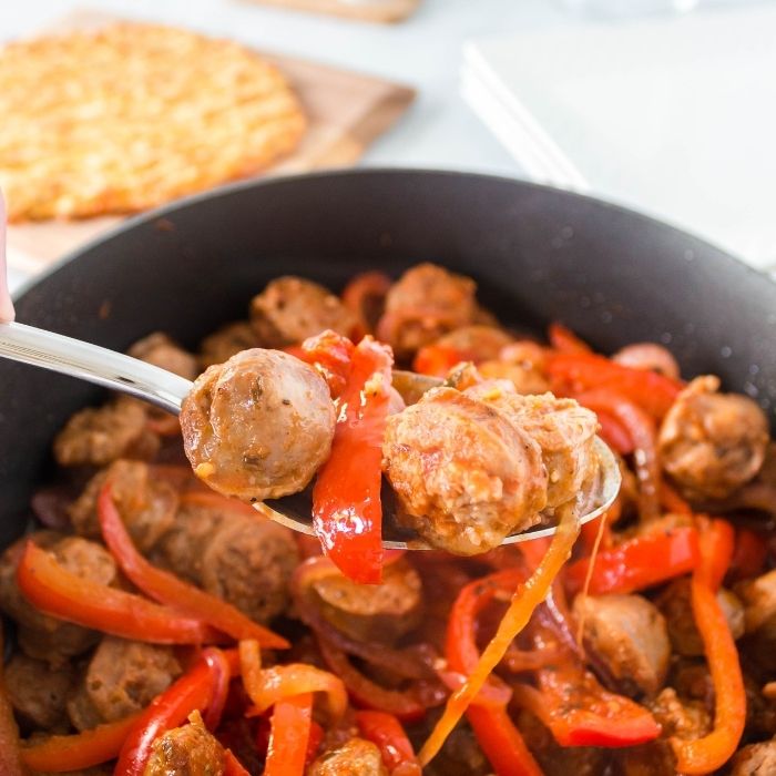spoon with pepper and sausage