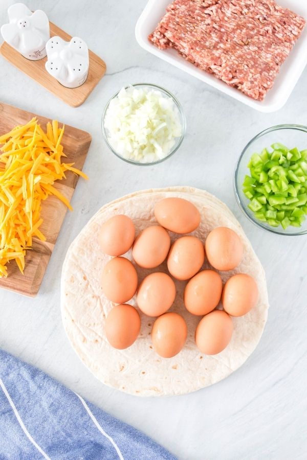 breakfast burrito ingredients on table 