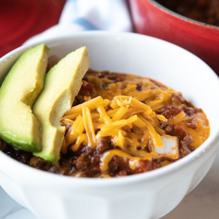 low carb chili in a white bowl 
