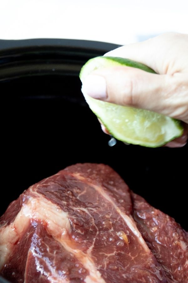 lime juice squeezed on pork