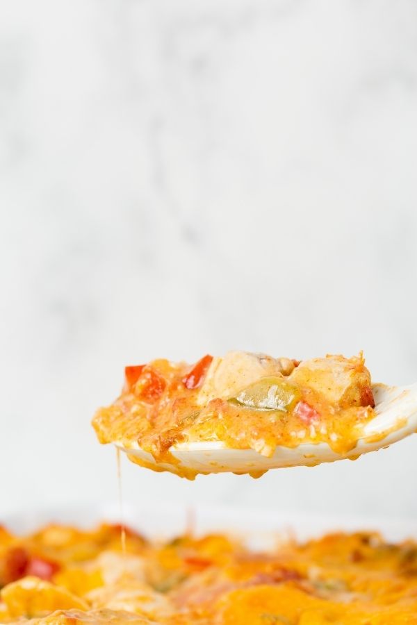 cheesy casserole on a spoon