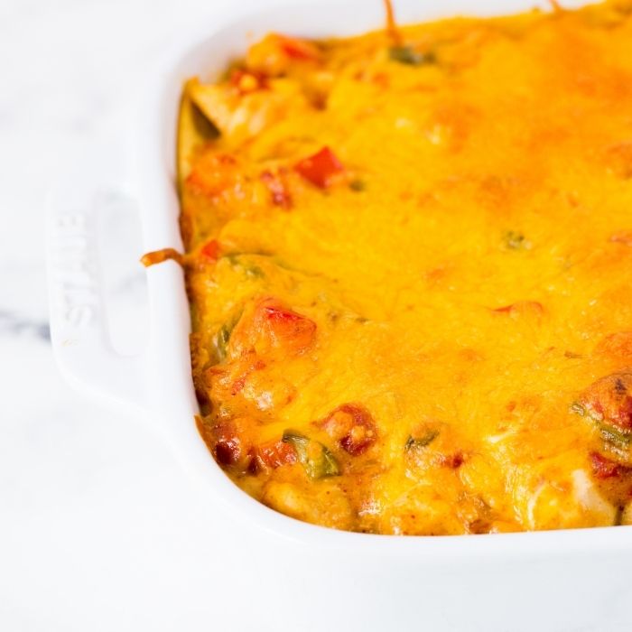 chicken corn tortilla casserole in pan on table