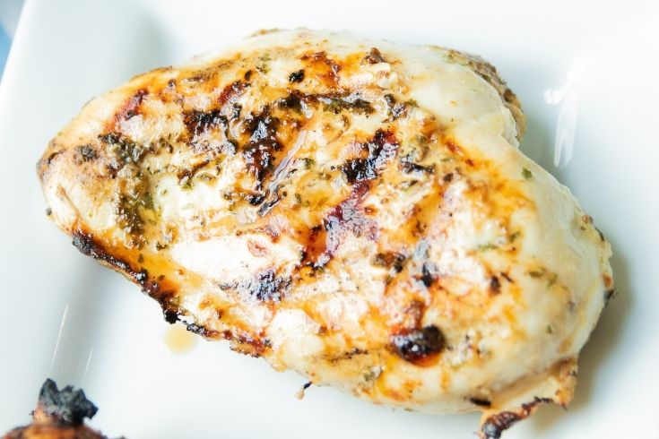 piece of chicken on a white tray